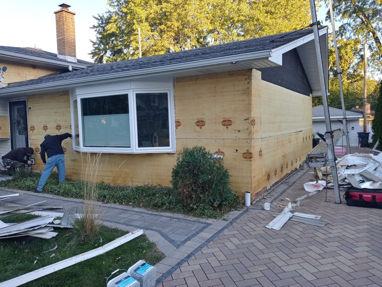 During siding and trim installation