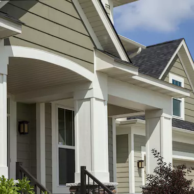 Home exterior front porch showing siding