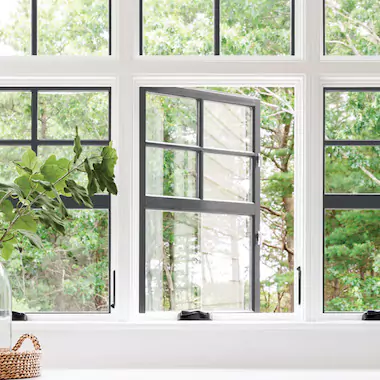 Home interior three double-hung windows